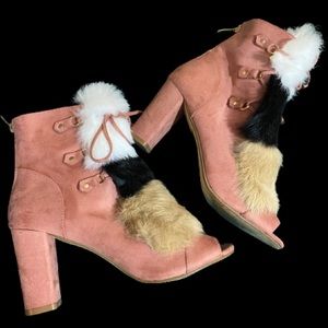Mauve fur booties.